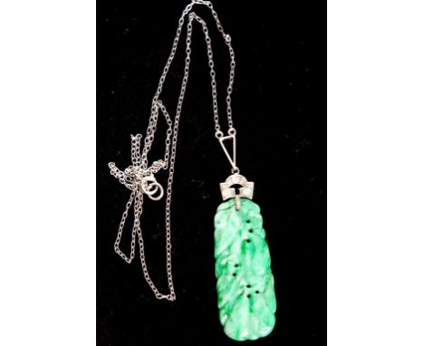 A VERY ATTRACTIVE 18K WHITE GOLD CARVED JADE PENDANT, set with small diamonds. (1) 
