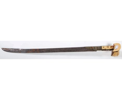 A GOOD BALKAN YATAGAN IVORY HILTED SWORD, with single edged slightly curved blade, with Arabic inscriptions, 25” (63cm), the 