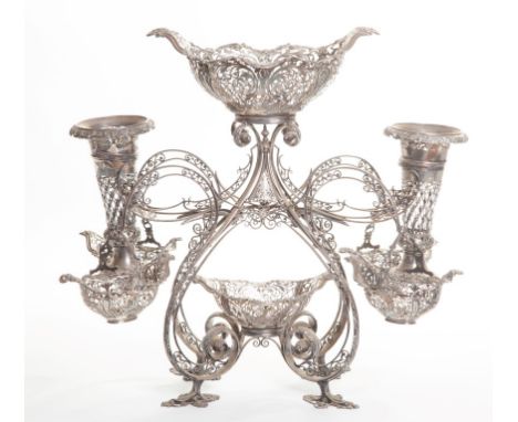 AN EXTREMELY ATTRACTIVE LARGE EDWARDIAN SILVER EPERGNE, by James Dixon and Sons Sheffield 1906, in the rococo style, the top 