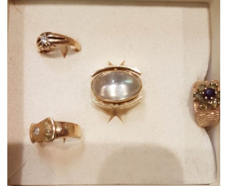 A HEAVY 18K GOLD DRESS RING, with oval rock crystal stone, 18g; together with an 18th century buckle ring, set with a chipped