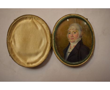 NINETEENTH CENTURY ENGLISH SCHOOL, oval miniature portrait of a gentleman, with trimmed grey powdered hair, black jacket, and