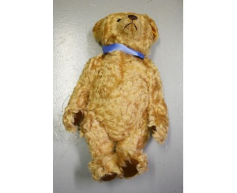 A PAIR OF STEIFF MILLENNIUM BEARS, button in ear, each in original packaging. (2) 