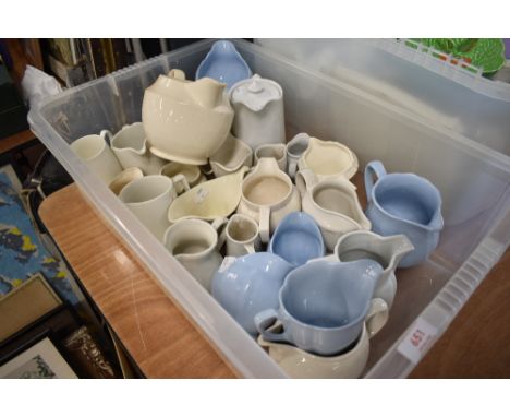 A selection of ceramic milk water and cream jugs