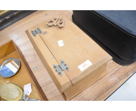 A pine trinket case with butterfly decoration