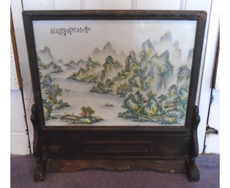 TABLE SCREEN, ebonised with ceramic of plaque on a stand, Chinese style, 67cm x 65cm. 