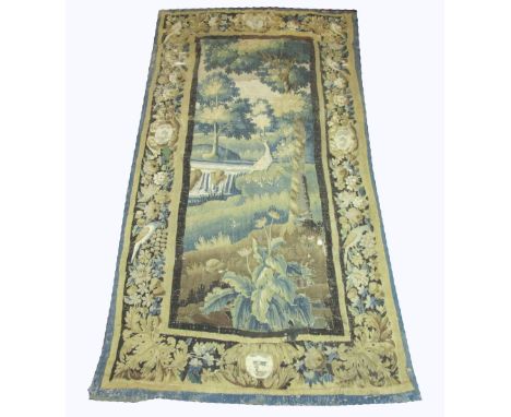 17TH CENTURY TAPESTRY, 250cm x 130cm, forest and lake scene inside a chestnut tree border. (with faults)