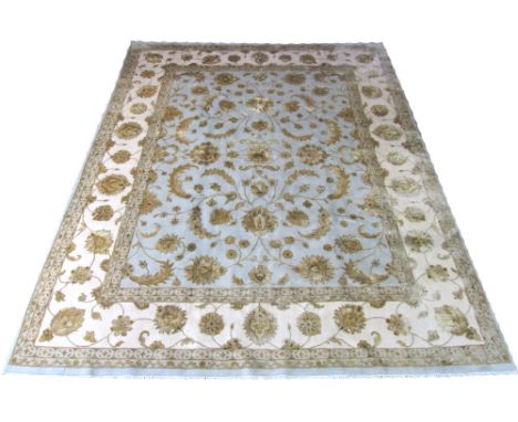 JAIPUR TABRIZ DESIGN CARPET, 303cm x 238cm, all over design of golden palmettes and scrolling vines on a sky blue field withi