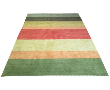 THE RUG COMPANY 'SHIFT' CARPET, by Christopher Sharp, 363 x 273cm, hand-knotted Tibetan wool in polychrome stripes.