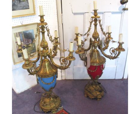 CANDELABRA TABLE LAMPS, a pair, each with four foliate cast lighting arms and central light, 92cm H max. (2)