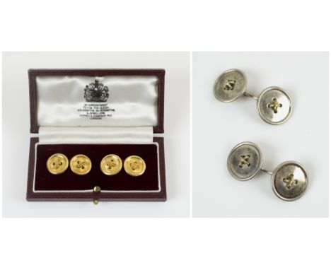 TIFFANY & CO. AND ASPREY CUFFLINKS 18K gold and silver cufflinks of button form, marked Tiffany & Co 750, and Asprey 925  Lon