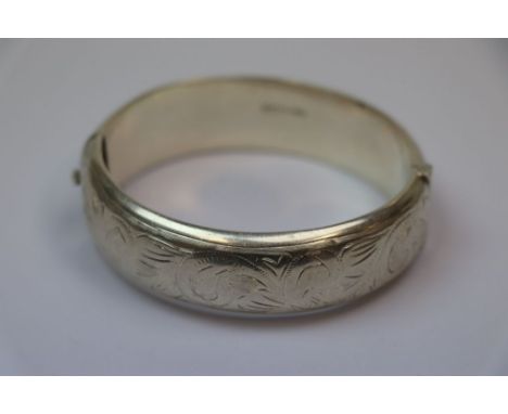 Hallmarked Silver Bangle type bracelet, hinged and part engraved