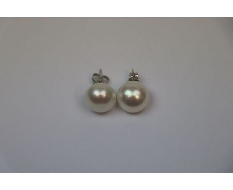 Pair of cultured pearl stud earrings on silver posts