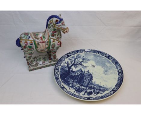 Large Delft Blue and White Charger depicting an Ice Skating Scene, 39cms diameter together with an Oriental Ceramic Horse