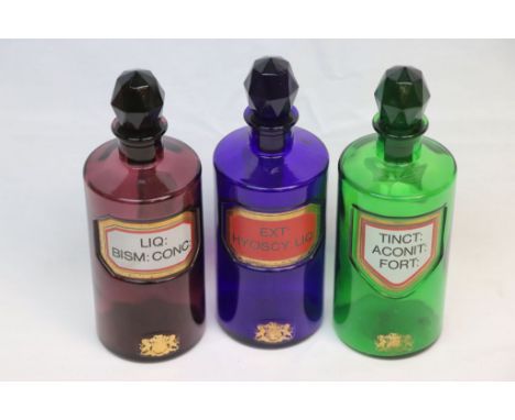 Three Coloured Glass Chemists Bottles with Stoppers, all labelled to include; Blue, Green &amp; Amethyst glass, each approx 1