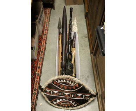 Collection of African Tribal Ethnic Items including Spears, Shield, Arrows, Axe, etc