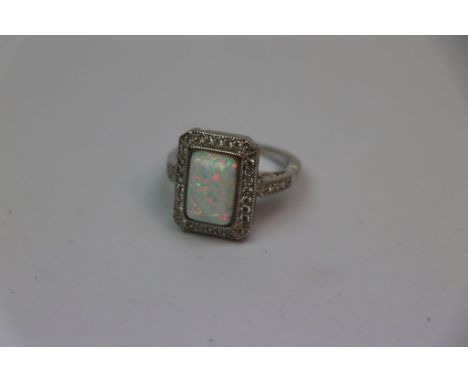 Silver CZ art deco style ring with central rectangular opal panel