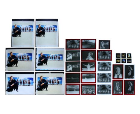 Six transparencies and 15 negatives of assorted elements of the poster concept with four negatives and six 35mm slides of pub