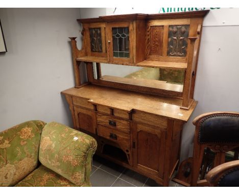 Art Nouveau mirror backed sideboard with copper panels and coloured leaded glass central door 153 x 47 cm H: 176 cm