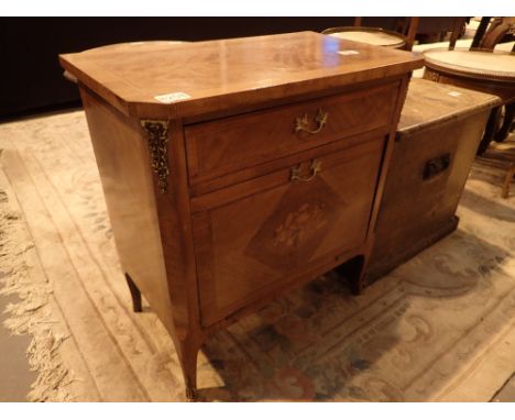 Reproduction inlaid Kingwood cabinet with a single long drawer above a fall front cupboard door with subtle ormulu mounts 