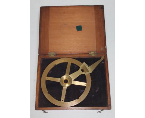 A brass single arm protractor in wooden case.  