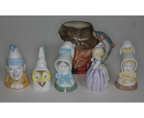 A group of five Royal Worcester candle snuffers and a Royal Doulton character jug The Poacher.  Condition - very good, no dam