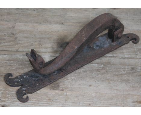 A wrought metal door knocker formed as a ducks head, length 32.5cm.  