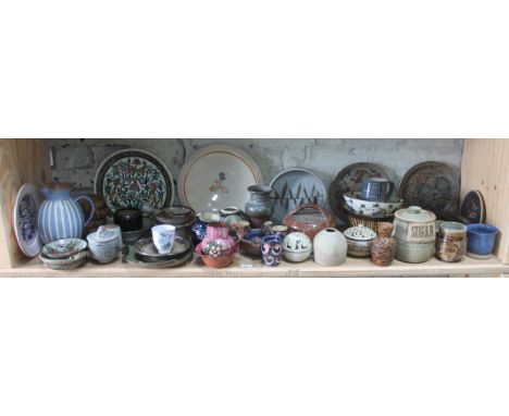 A shelf of mainly studio pottery, various potters and studios, approx. 44 pieces.  