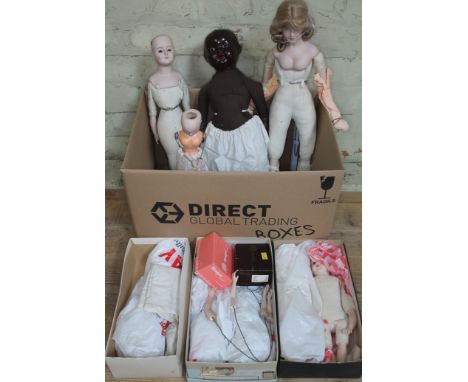 Two boxes of mainly ceramic dolls bodies, body parts and accessories etc  