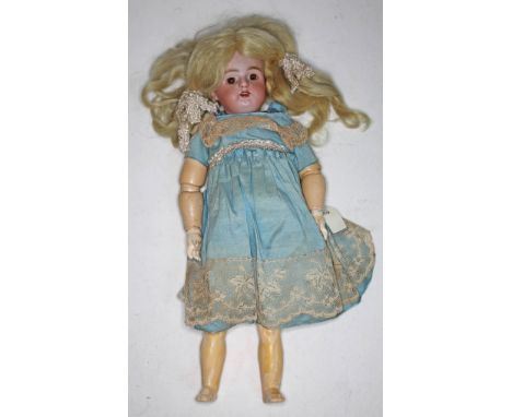 An early 20th century German bisque doll Heinrich Handwerck, Germany, Halbig, with glass static eyes, composite articulated a