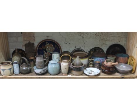 A shelf of approx. 40 pieces of mainly studio pottery, various potters and studios.  