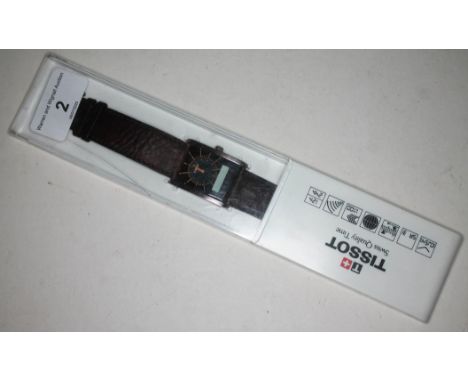A Tissot Two-Timer digital wristwatch with brown leather strap, original box and papers, case 35 x 27mm.  