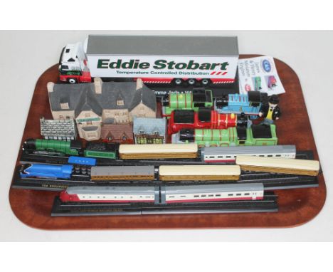 A mixed lot comprising five Wade Thomas the Tank Engine figures; Percy, James, Henry, Sir Topham Hat (The Fat Controller), to