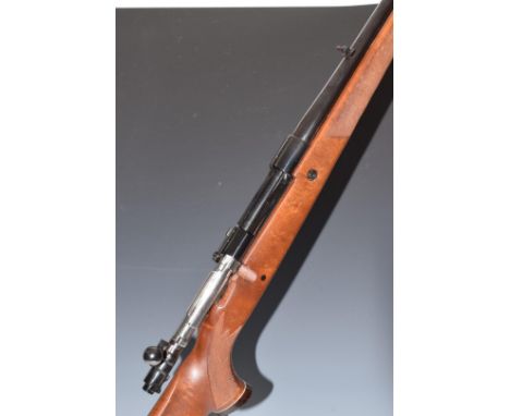 Parker-Hale .308 bolt action rifle with chequered semi-pistol grip and forend, raised cheek piece, pop-up sights and 24.5 inc