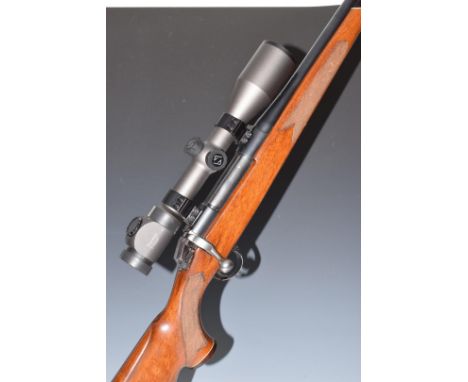 BSA .243 bolt-action rifle with chequered semi-pistol grip, raised cheek piece, Zeiss Duralyt 3-12x50 scope, sound moderator 
