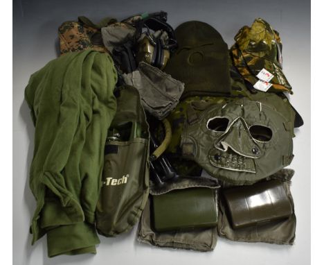 Modern military equipment including two webbing vests, entrenching tool, cleaning kits, ear defenders, bullet proof vest etc