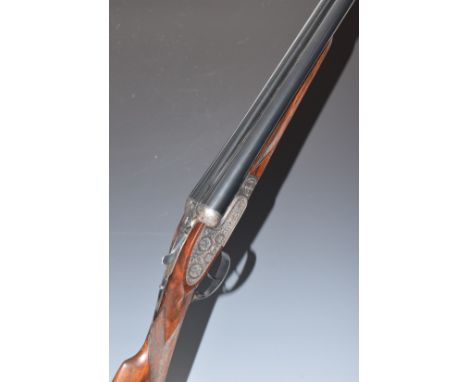 Laurona 12 bore side by side sidelock ejector shotgun with named and engraved lock, engraved trigger guard, underside, fences