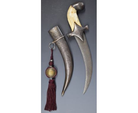 North African Jambiya dagger with Arabic script to the eight inch curved Damascus blade, bone grip and niello decoration to t