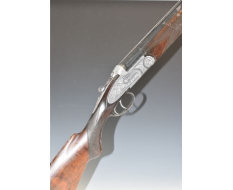 Italian 12 bore over and under ejector shotgun with engraved&nbsp;engraved locks, underside, trigger guard, top plate and thu