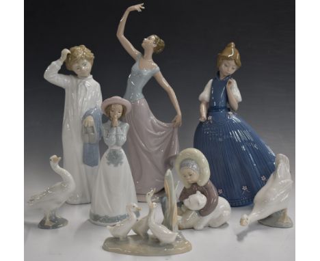 Eight Lladro and Nao figures, tallest 35cm