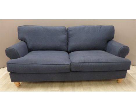 A modern navy three seat sofa on turned wooden feet, W180 x D93cm x H90cm