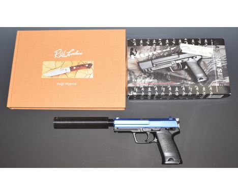 Hunter 6mm airsoft air pistol with sound moderator in original box, together with a limited edition copy of R W Loveless by L