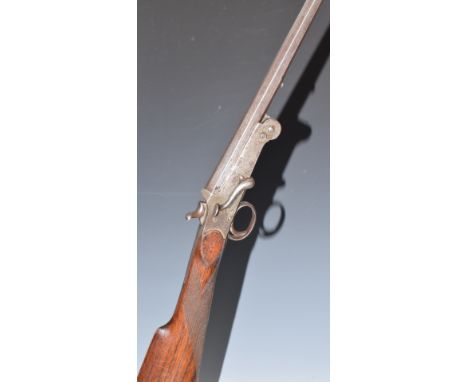 Foreign .410 single barrelled folding poacher's shotgun with chequered grip, side lever and 28 inch part octagonal barrel, ov