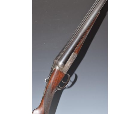 Thomas Wild&nbsp;12 bore&nbsp;side by side shotgun with engraved scenes of birds to the named locks, engraved underside, trig