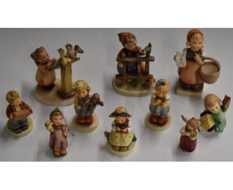 Ten Hummel Goebel figures including 'Signs of Spring', 'Monkey Business' and 'Love Petals'