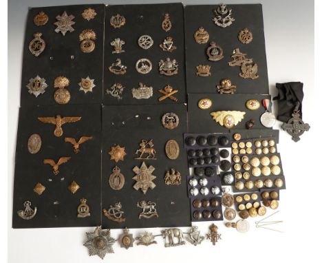 A collection of over 50&nbsp;military badges and buttons etc including Irish Guards valise badge, 20th Hussars with makers J 