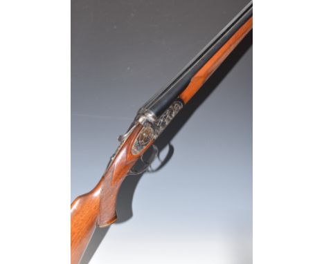 Denton &amp; Kennell 20 bore side by side shotgun with engraved scenes of dogs to the locks, engraved sidelock plates, cheque