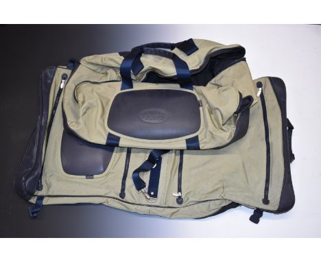 Land Rover suit bag with additional compartments and a similar holdall