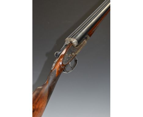 AYA No.2 sidelock side by side ejector shotgun with all over scrolling engraving, chequered grip and forend, carved teardrop 