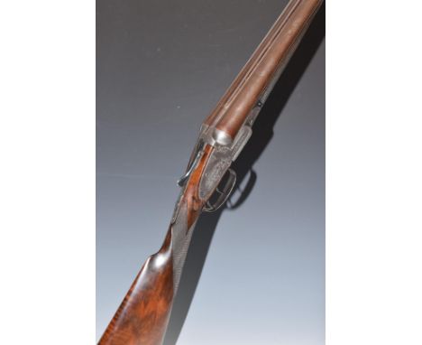 Charles Hellis 12 bore side by side sidelock ejector shotgun with named and engraved locks, scrolling engraving to the unders