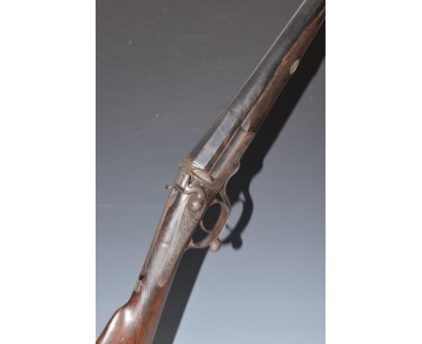 John Ilsley 12 bore single barrelled hammer action shotgun with engraving of dogs to the lock, scrolling engraving to the loc